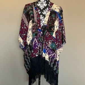 Gorgeous black fringed kaftan in fun patch worked print